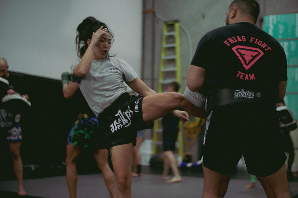 serena solo kicking thai pads.JPG