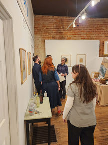 Visitors at the gallery's Artist Reception on Last Fridays.