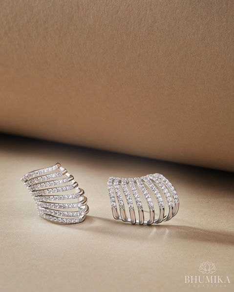 Elegant earrings featuring dazzling diamonds, captured in a creative lifestyle moodshot image by Bhumika Creatives Product Photography