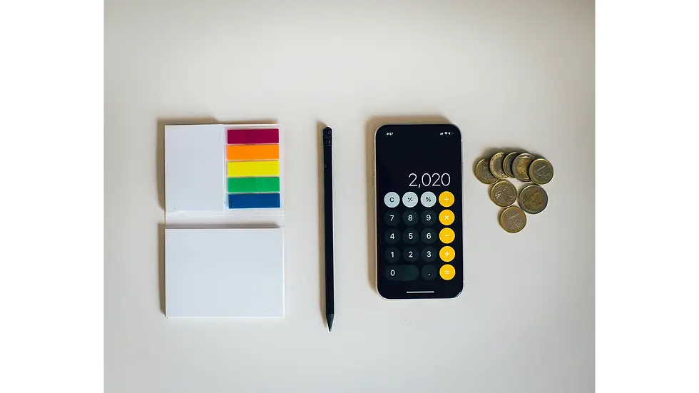 Flat lay with calculator on smartphone, coins, pen, and sticky notes showing methods for budgeting clearly