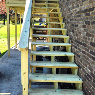 Exterior deck stairs and outdoor railing project by Titan Property Professionals