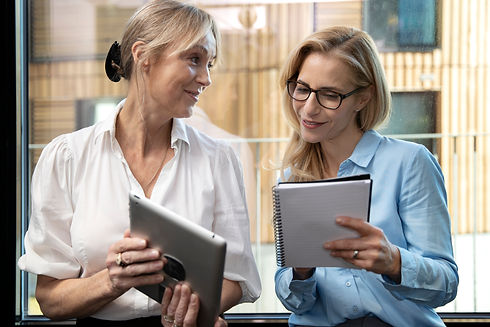 medium-shot-businesswomen-working-together.jpg