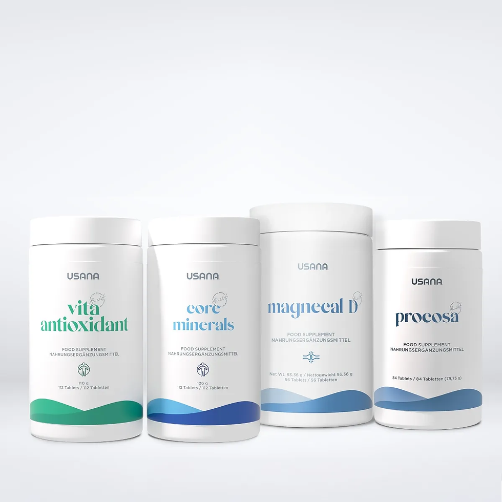 Four white USANA supplement bottles labeled vita antioxidant, core minerals, magnecal D, and procosa on a white background.