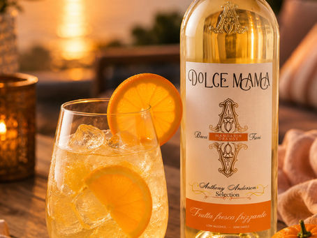 an image of a bottle of dolce mama orange wine and a cocktail
