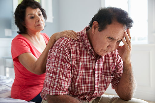 Wife-Comforting-Senior-Husband-Suffering