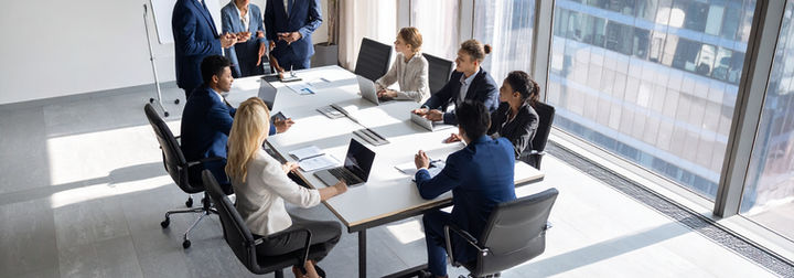 Firefly_team meeting around board table 442852(1).jpg
