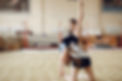 coach-with-student-girls-gymnasts-performs-various-gymnastic-exercises-jumping-childs-spor