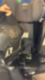 Stained child seat before car seat cleaning services
