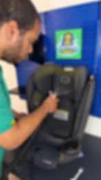 Professional car seat cleaning services using vacuum tools.