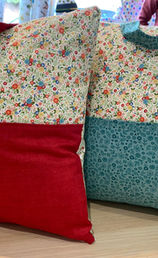 Custom order book cushion made from 100% cotton with pocket and handle, designed for readers.