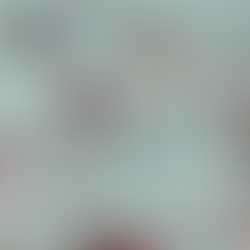 Assorted festive cotton fabrics neatly stacked, ready to be sewn into Christmas cracker hat.