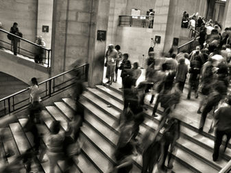 Crowd of workers on outdoor stairs, representing 2026 employment law updates