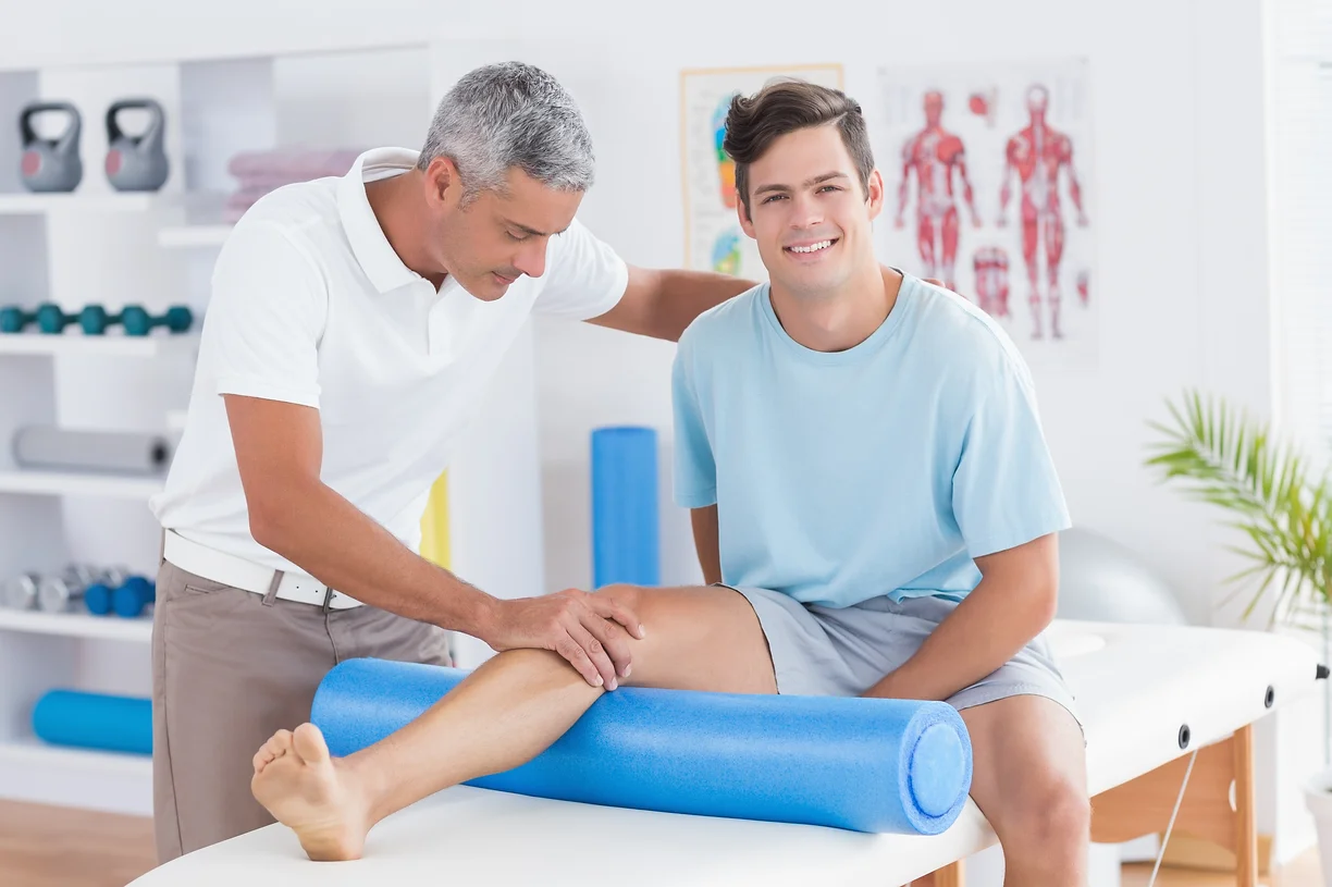 doctor-examining-his-patient-leg.webp