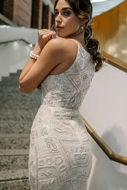 High neck beaded wedding dress with puddle train.