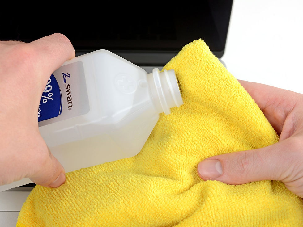 90% alcohol pouring onto a dry microfiber yellow towel