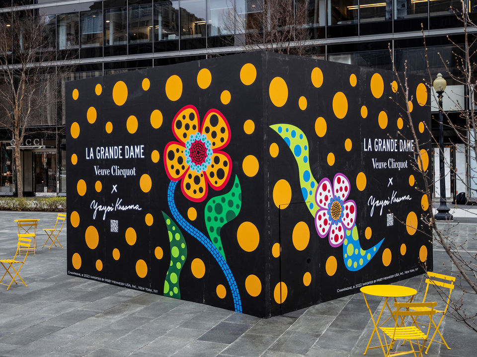 Printed graphics on an outdoor box structure in the middle of the city streets