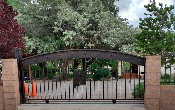 Ornamental decorative wrought iron gate and automatic gate opener by Delgado Wrought Iron in Albuquerque New Mexico