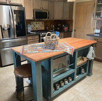 Custom Wood Countertop kitchen island with natural stain and turquoise shelves by Narrow Leaf Woodworks in Albuquerque
