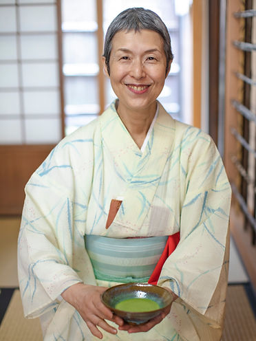 Japan Kanazawa Tea Ceremony Master Holding Matcha Portrait Vertical.jpg