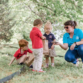 Kids outside looking at nature