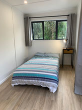 Photo shoot of our cabin being used as a bedroom