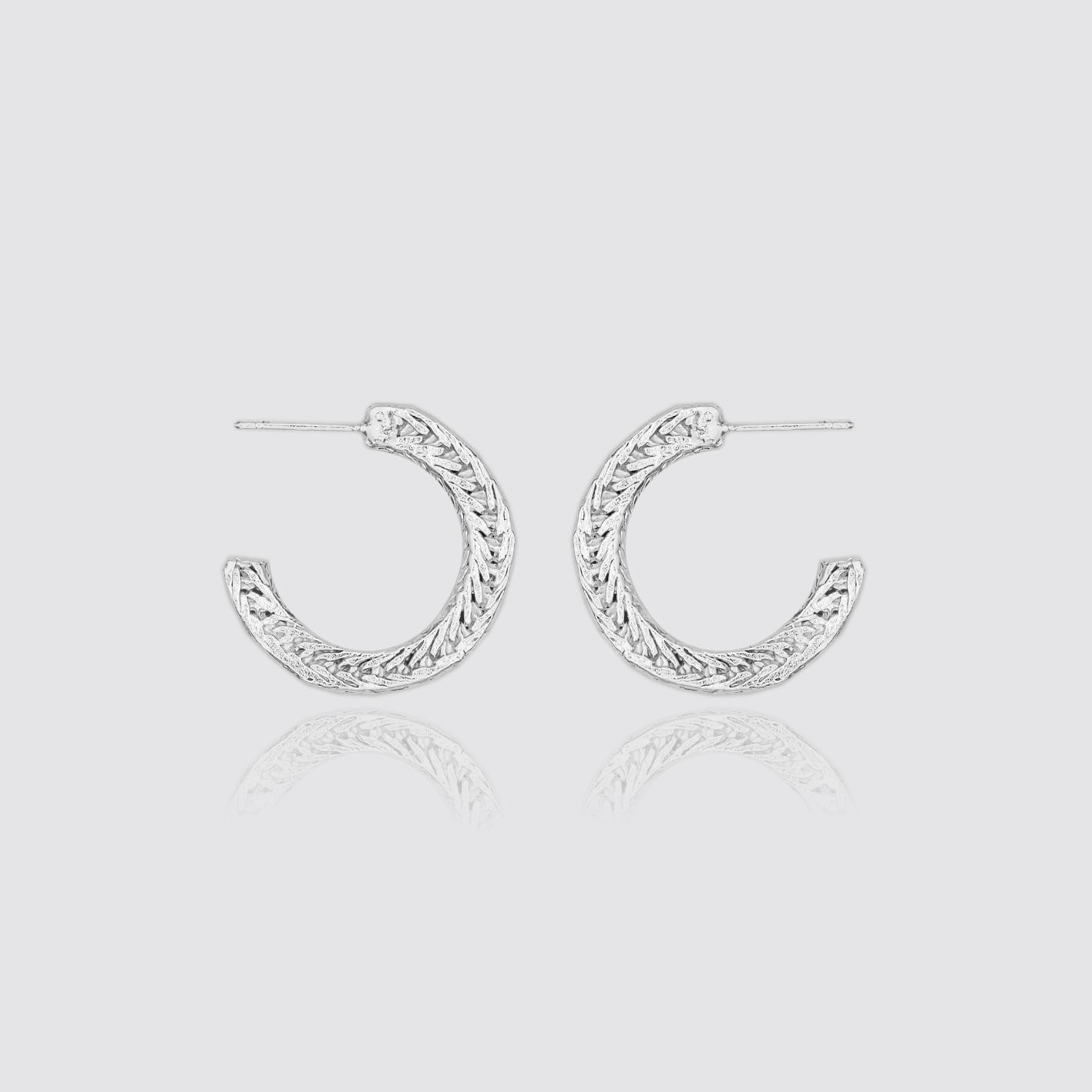 Intertwined hoop earrings in 925 silver
