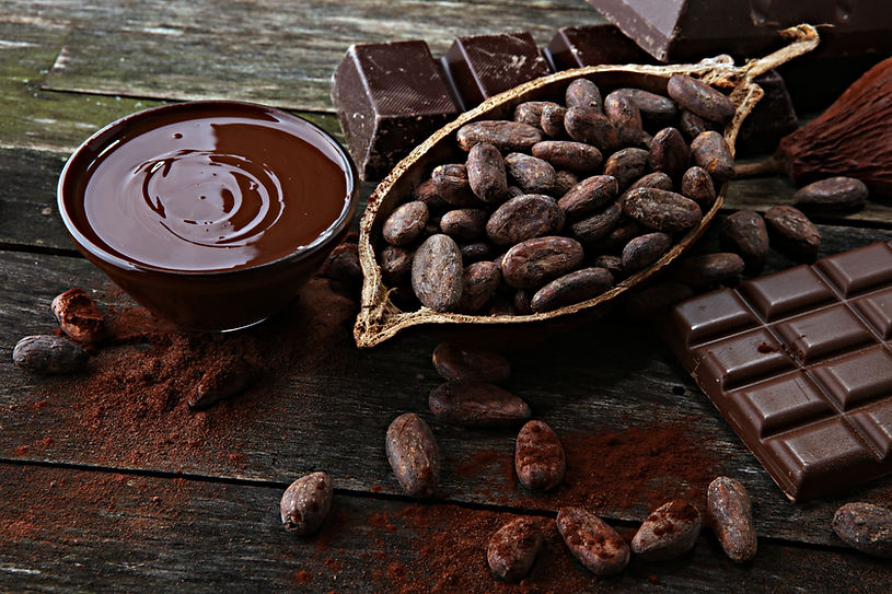 Melting chocolate or melted chocolate and chocolate swirl. stack and powder.jpg