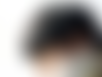 A boy looking into the distance.