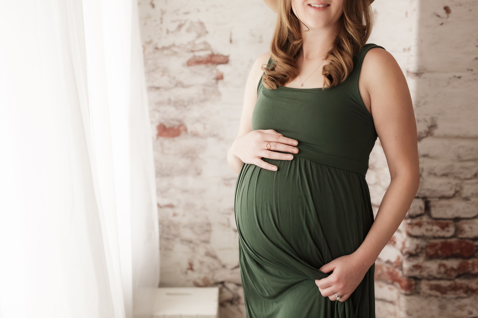 maternity bump in green dress
