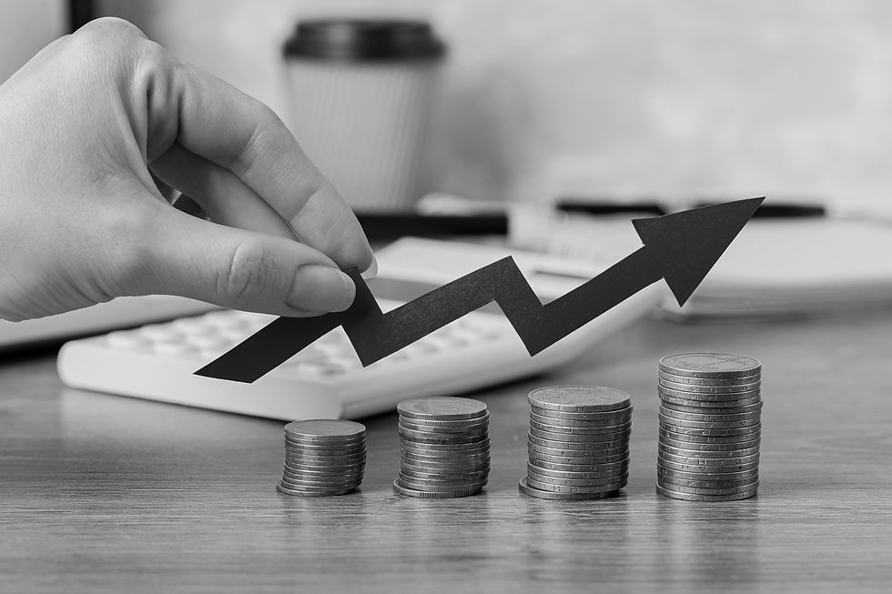 hand-holding-growth-arrow-with-coins_edited.jpg
