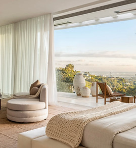 Primary suite in a luxury modern Bel Air home with elegant, design-forward interiors