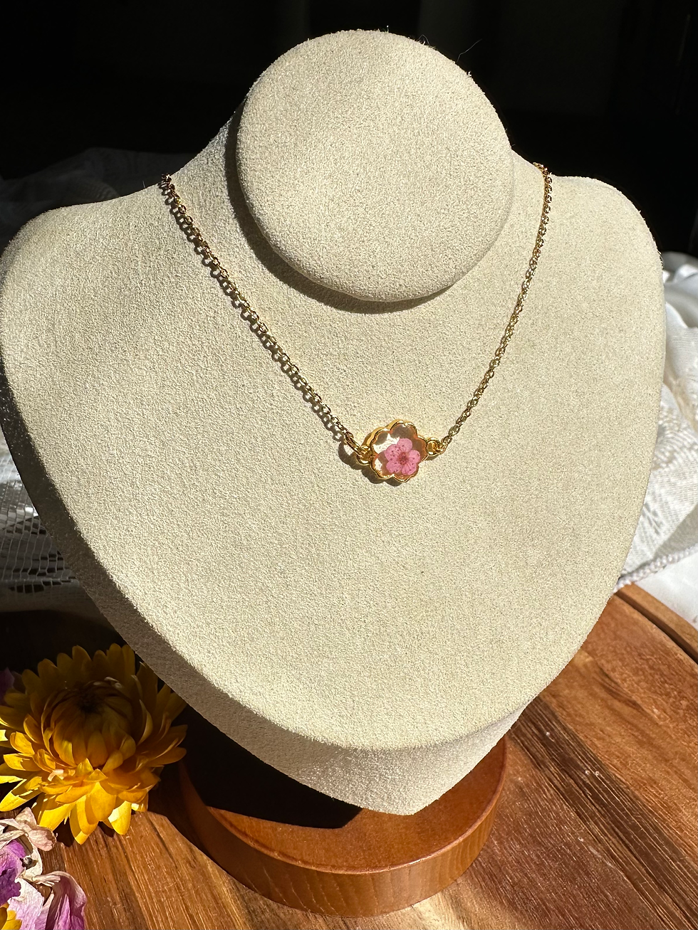 Thumbnail: flower-shaped gold floral necklace