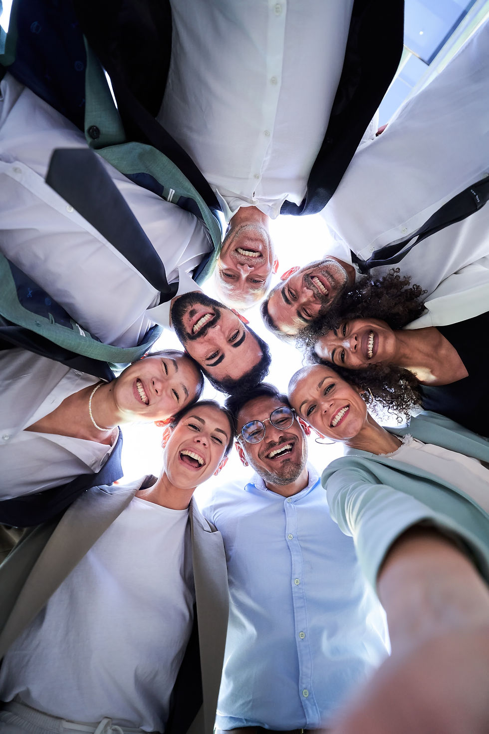 selfie-of-group-of-business-people-embraced-in-cir-2023-11-27-04-53-37-utc.jpg