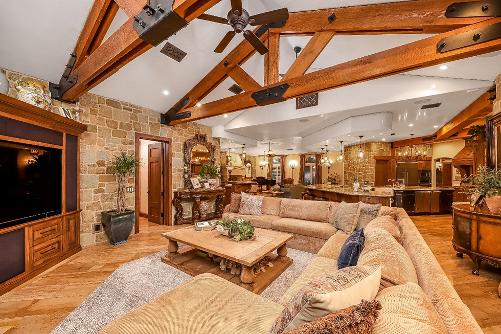 An open-plan living area and more in a rustic home