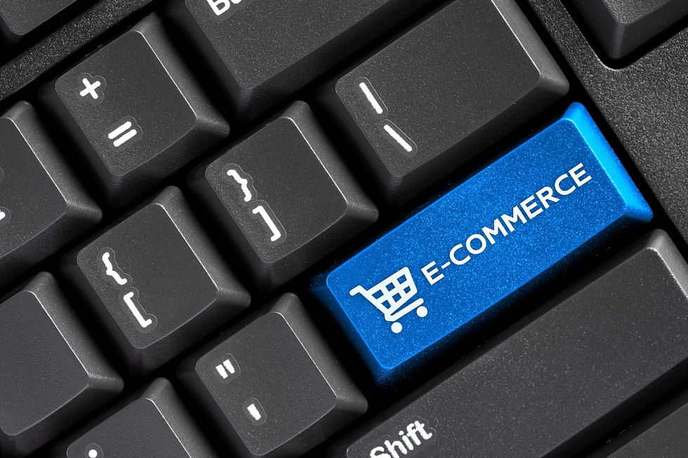 Blue E-COMMERCE key with shopping cart on keyboard