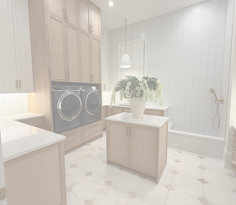 Modern laundry room with wood cabinets and black appliances