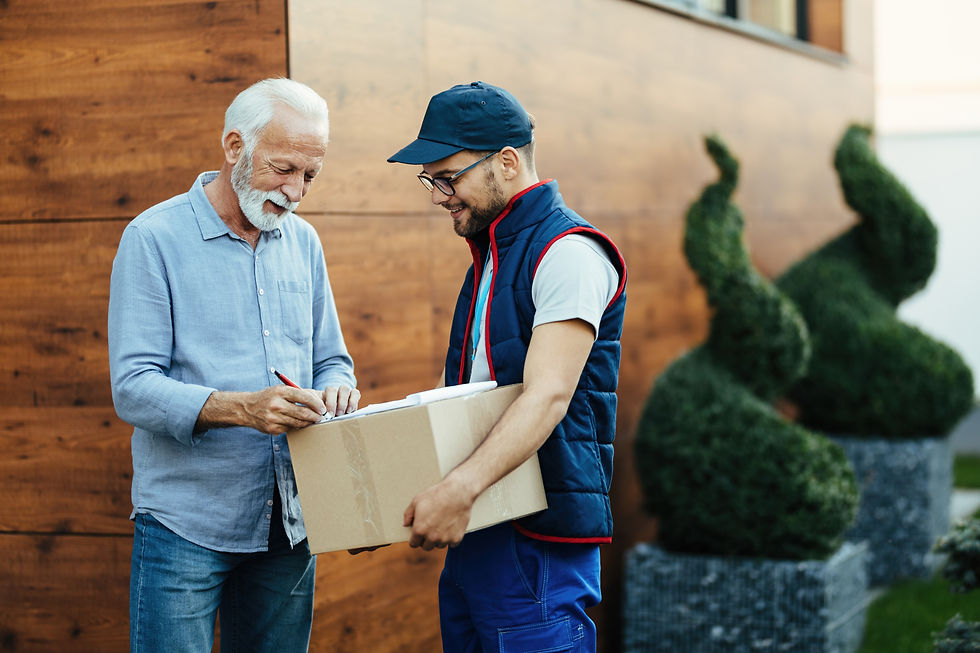 Man signing for package delivery