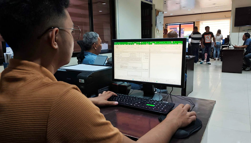 Eye-level view of a computer workstation with coding on the screen