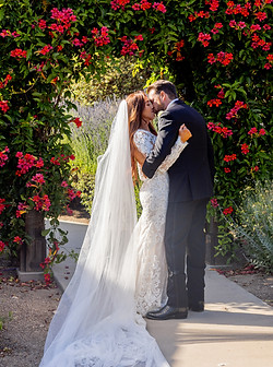 bride and groom kissing at bernardus loge in carmel valley, ca