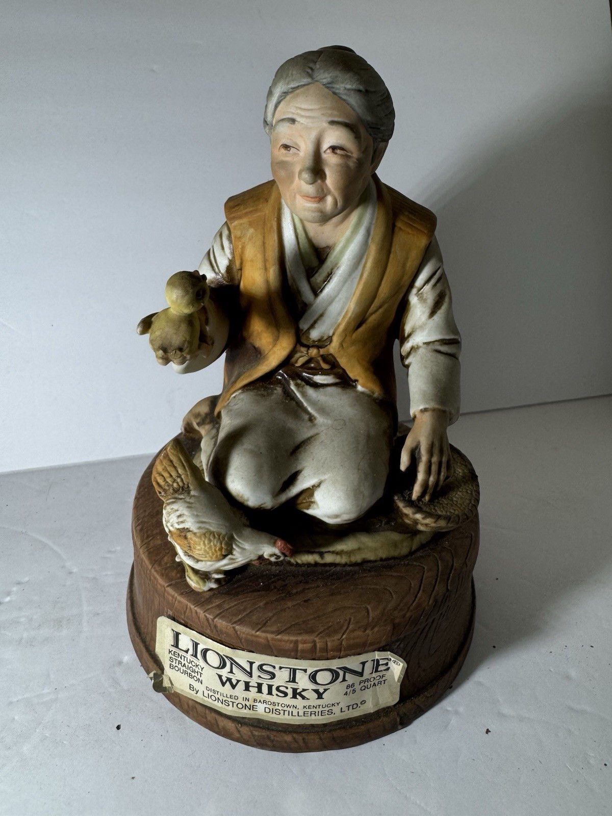 VTG Lionstone Whiskey Decanter – 1974 “Far East Collection” Porcelain Figurine