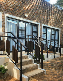 Ramp and stair access to bedrooms.