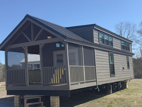 Gray Park Model Tiny Home With 10' Screened Porch