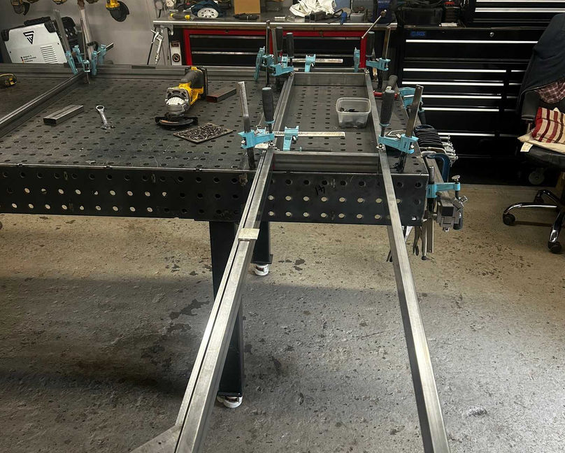 Welding table with clamps and tools