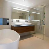 A bathroom with double sinks