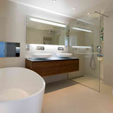 A bathroom with double sinks