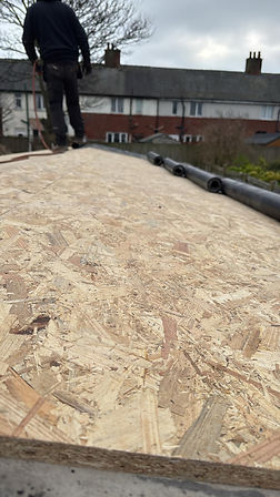 Roof construction with wood paneling