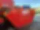 side view of a red skip