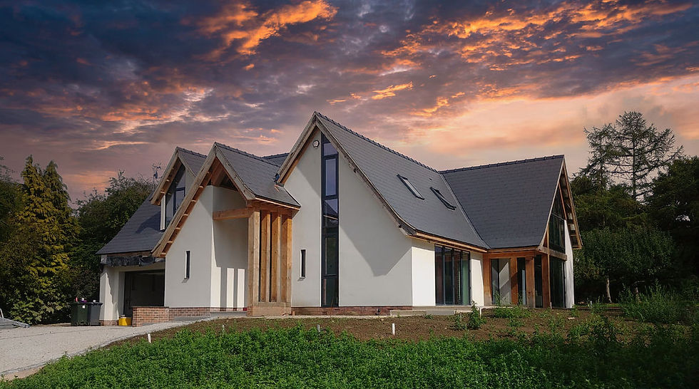 A home under construction with a cloudy sky in the background