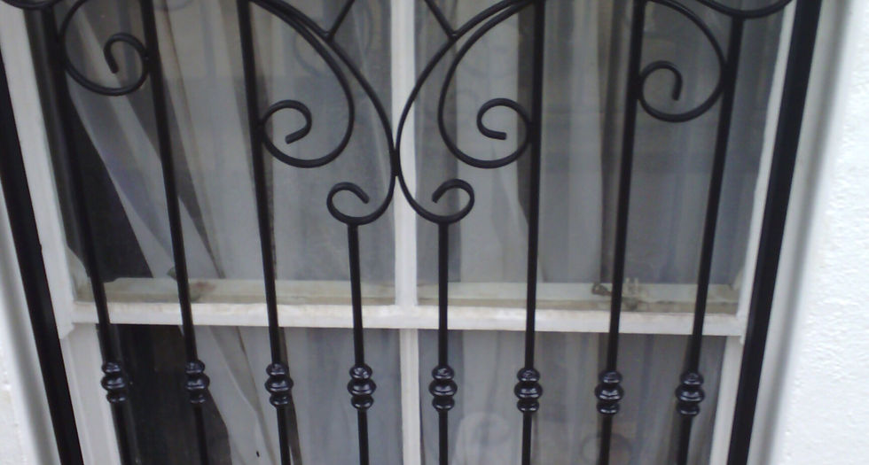 Security window with black metal grill