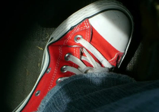 The Woman WIth the Red Shoes